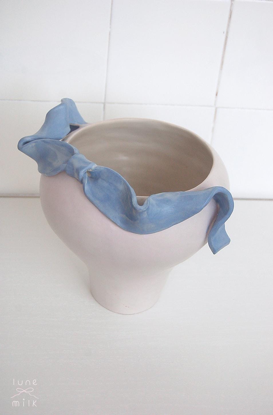 Organic pale lavender ceramic vase natural stoneware with a flowing ribbons design decorating the top, handmade high temperature