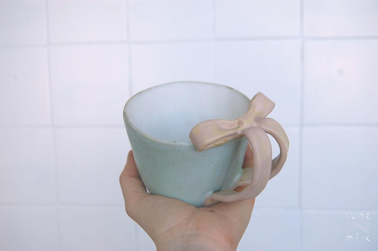 Mug tea and cappuccino organic natural bow stoneware light turquoise with pink bow handles, pastel matte glazes, L size