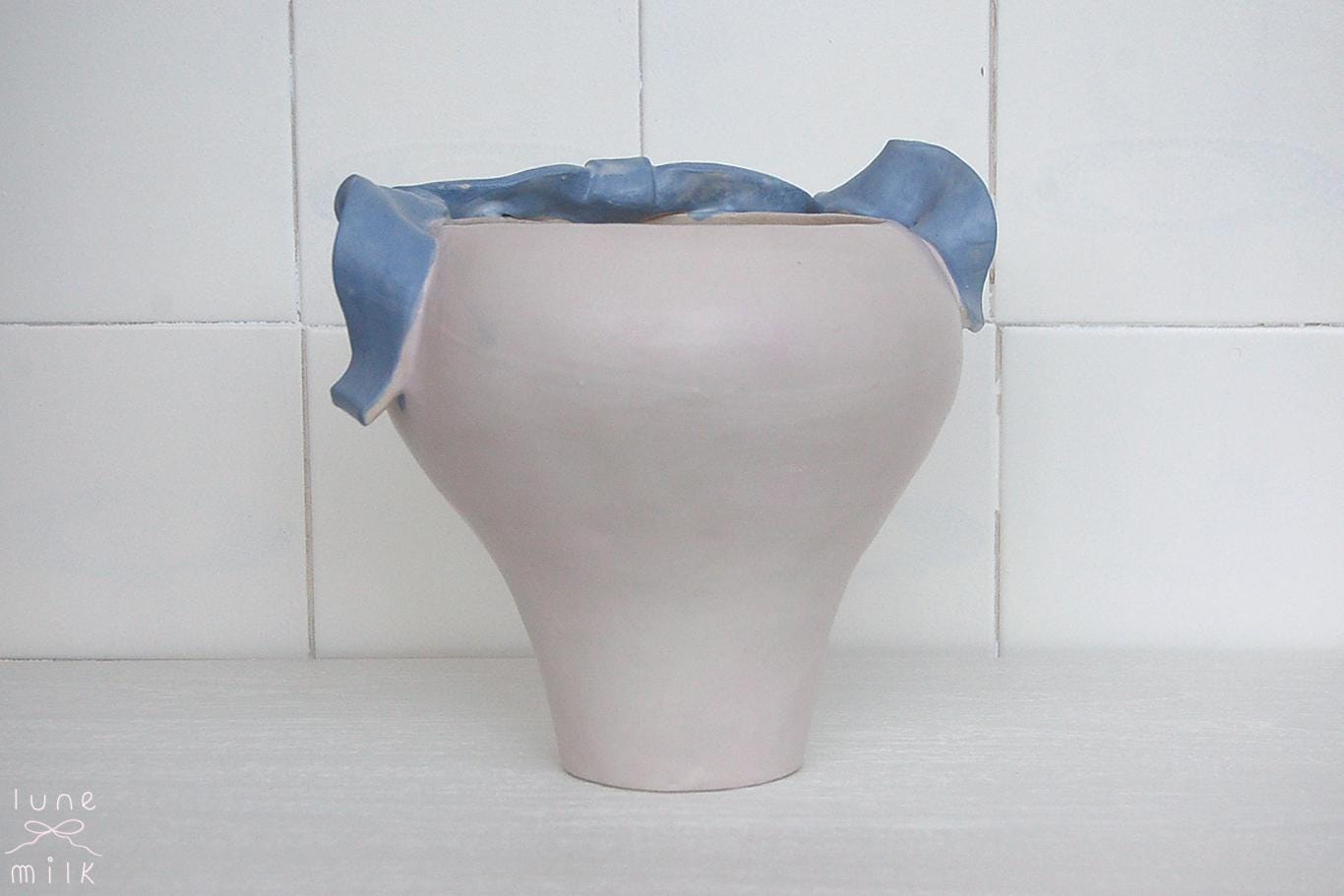 Organic pale lavender ceramic vase natural stoneware with a flowing ribbons design decorating the top, handmade high temperature