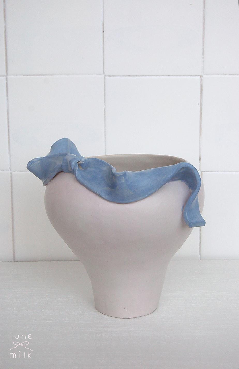 Organic pale lavender ceramic vase natural stoneware with a flowing ribbons design decorating the top, handmade high temperature