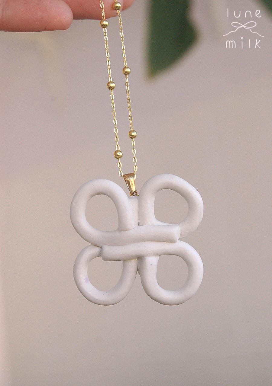 Lucky charm chinese knot, made in limoges porcelain, handmade organic