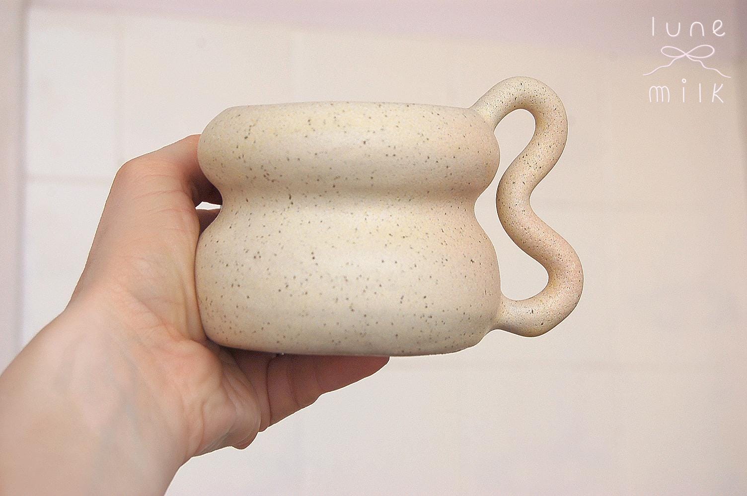 Ceramic Mug cappuccino organic natural stoneware almond milk and pastel blue color glazes, handmade wheel thrown with wavy handle