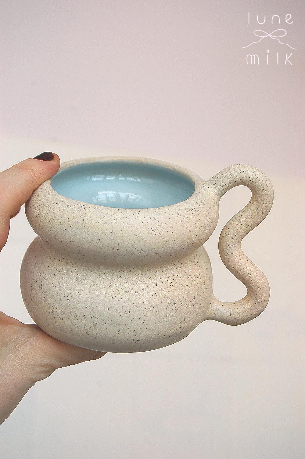 Ceramic Mug cappuccino organic natural stoneware almond milk and pastel blue color glazes, handmade wheel thrown with wavy handle